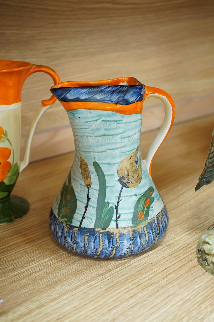 A Beswick woodpecker, two Myott jugs and two Wedgwood teapots and covers, largest 22cm